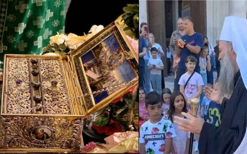 кивот са Часним појасом Мајке Божије и српски патријарх Порфирије са децом испред Храма